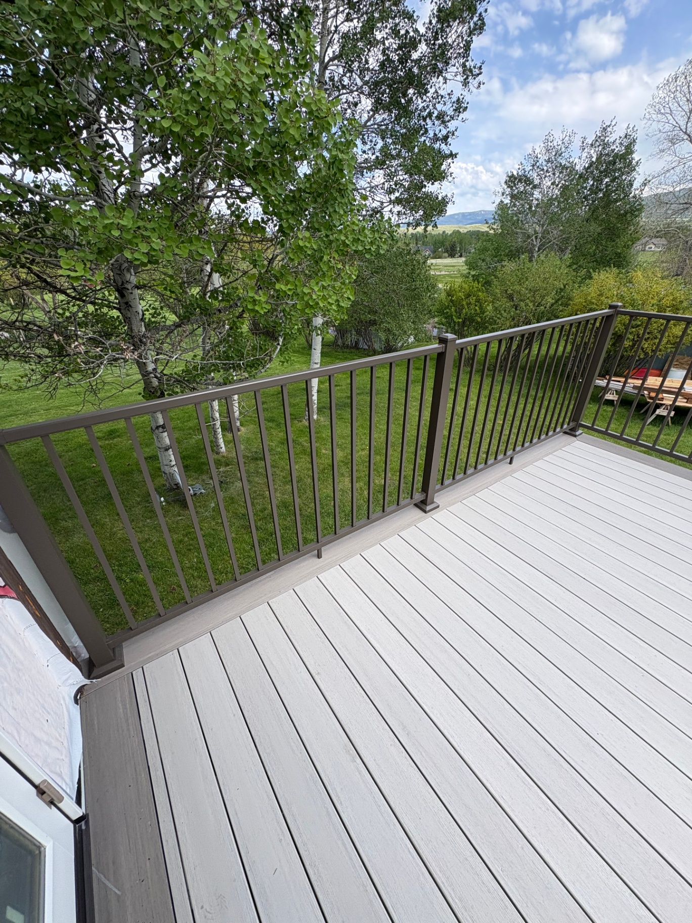 Composite deck with black aluminum railing